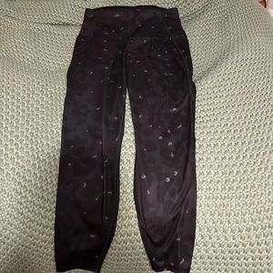 All in Motion.. black leopard print cropped leggings. Has pockets on the sides.